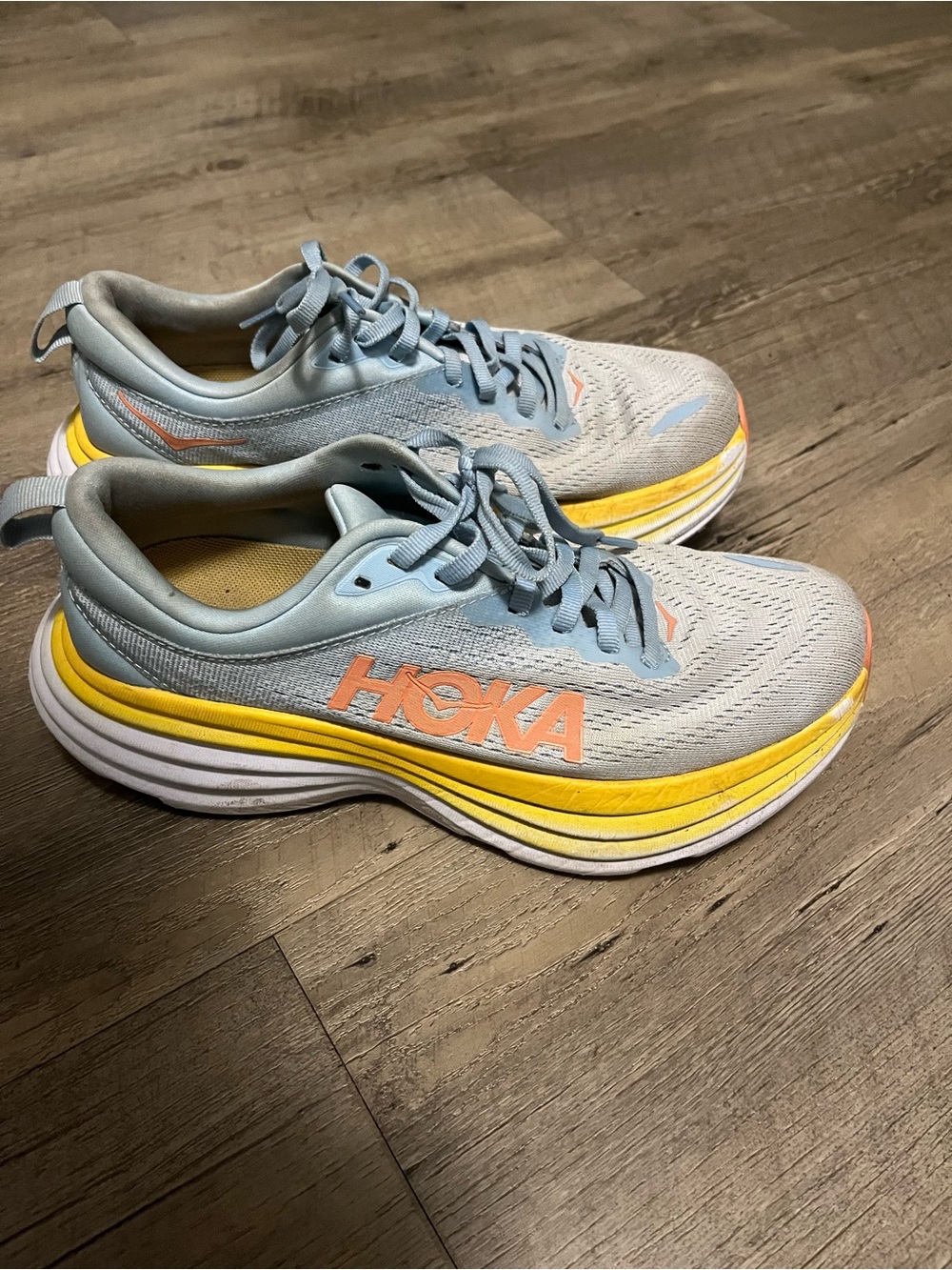 Hoka One One Light Blue Sneakers with Yellow and Coral Accents